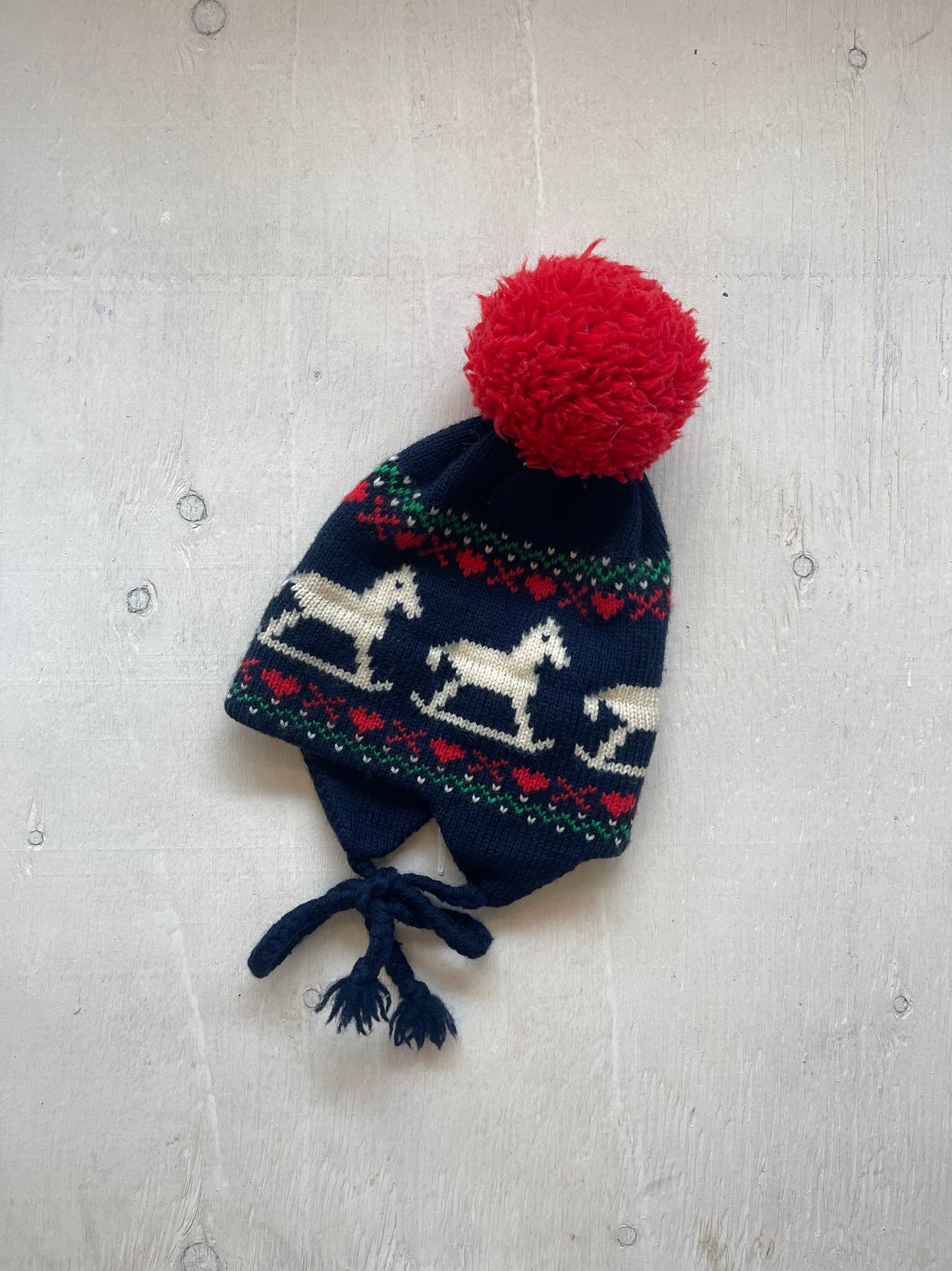 Tuque en laine 9-12M, par Murray Merkley