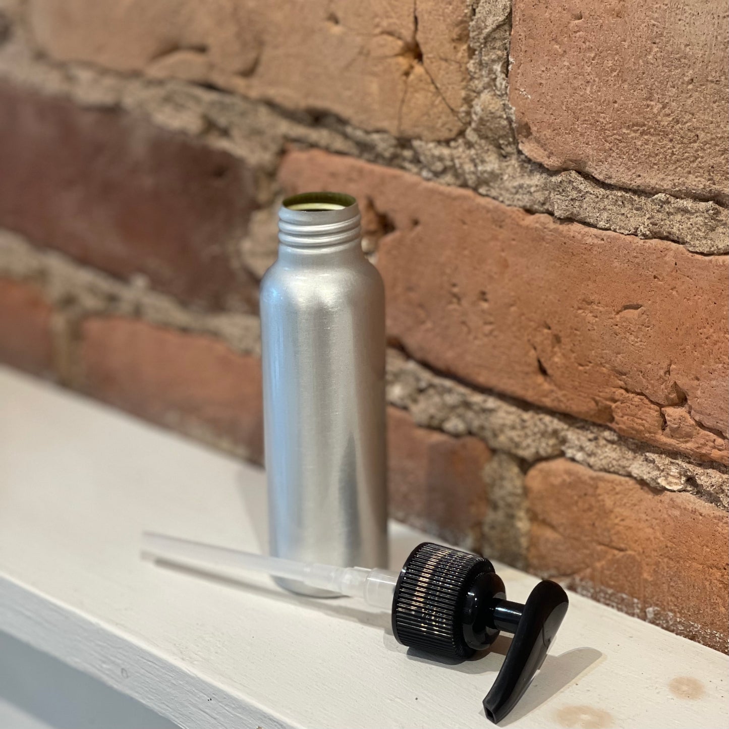 Bouteille en aluminium avec pompe
