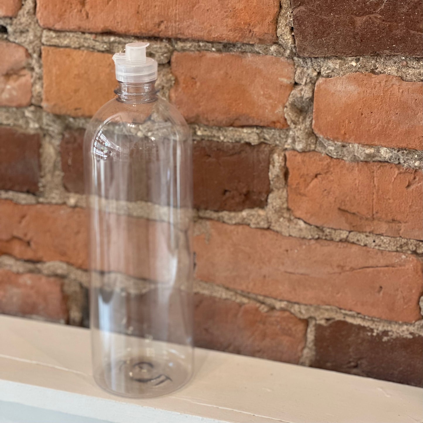Bouteille en plastique avec bouchon snap