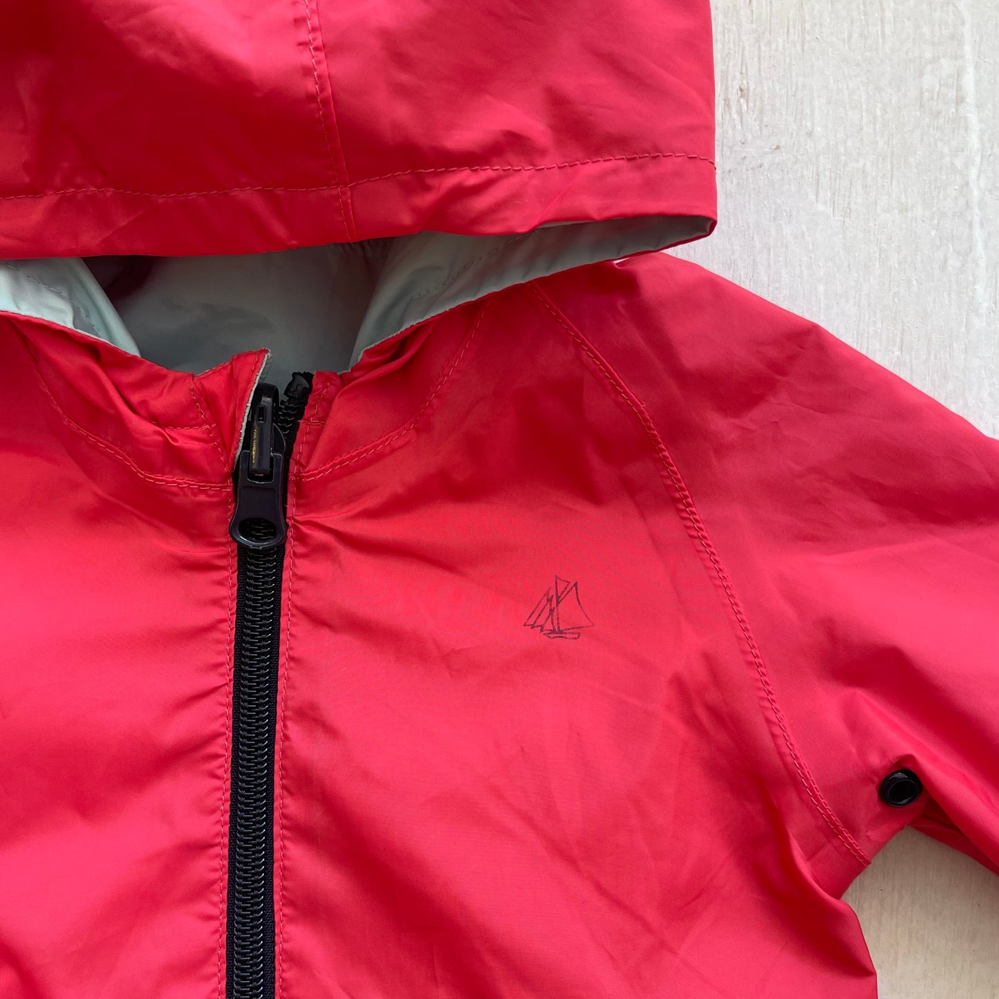 Manteau imperméable réversible 12M, par Petit bateau