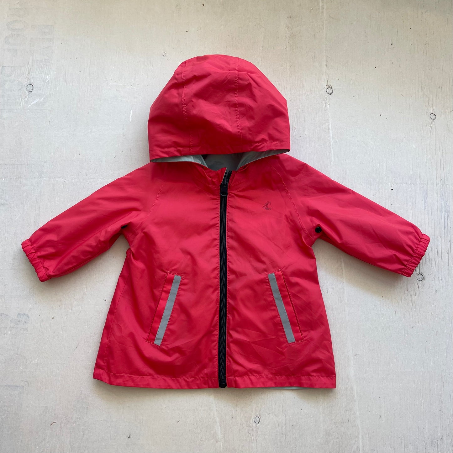 Manteau imperméable réversible 12M, par Petit bateau